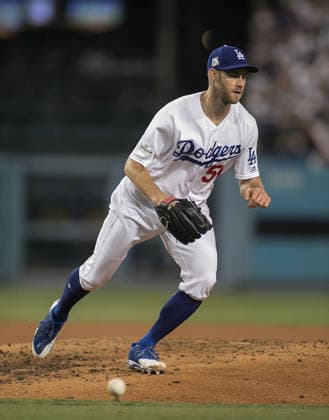 October 7, 2017 - Los Angeles, California, U.S - Relief pitcher, Tony Cingrani 54 of the Los Angeles Dodgers goes for a bunt ball during Game 2 of the NLDS against the Arizona Diamondbacks on Saturday October 7, 2017 at Dodger Stadium in Los Angeles, California. Dodgers defeat Diamondbacks, 8-5. Copyright: xJavierxRojasx