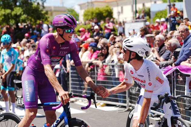 Switzerland™s Jan Christen of UAE Team Emirates XRG and France™s Paul Magnier of Soudal Quick-Step during Stage 4 of the Giro d™Italia, from Catanzaro to Cosenza, Italy, Tuesday, May 12, 2026.  Copyright: xMassimoxPaolone LaPressex