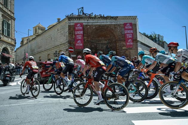 May 12, 2026, Catanzaro, Catanzaro, Italy: Passing through Piazza Matteotti. The fourth stage of the 2026 Giro d Italia, the first in Italy, started from the Mediterranean Biodiversity Park in Catanzaro and headed toward Cosenza, covering 138 kilometers. Catanzaro, May 12, 2026 Giro D Italia. Departure From Catanzaro  - ZUMAa289 20260512_zia_a289_063 Copyright: xValeriaxFerrarox xAgfx