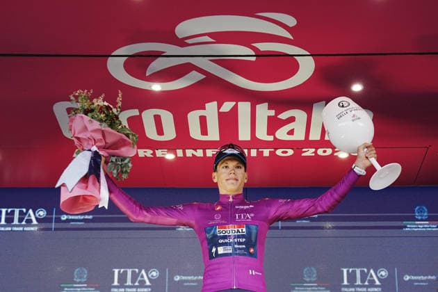 France™s Paul Magnier of Soudal Quick-Step cyclamin jersey on the podium during Stage 4 of the Giro d™Italia, from Catanzaro to Cosenza, Italy, Tuesday, May 12, 2026.  Copyright: xGianxMattiaxD Albertox xLaPressex