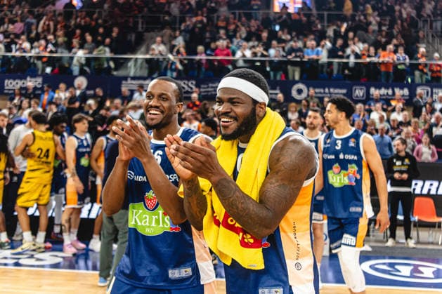Rostock, Germany 12 May 2026 easyCredit BBL Play Ins 2025 2026 Rostock Seawolves vs MHP Riesen Ludwigsburg Pictured from left Phillip Greene IV Rostock Seawolves and TJ Crockett Jr Rostock Seawolves Stadthalle Rostock Mecklenburg Vorpommern Copyright: xFotostandx xVoelkerx