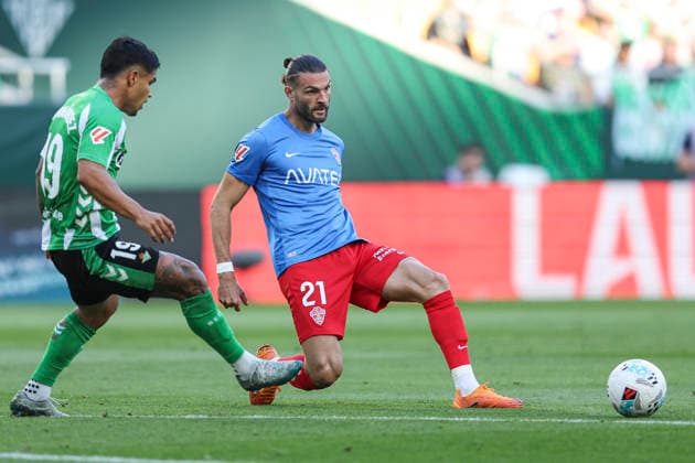 ESP: Real Betis - Elche CF. La Liga EA Sports. Date 36 Leo Petrot of Elche CF and Juan Camilo Cucho Hernandez of Real Betis during the La Liga EA Sports match between Real Betis and Elche CF played at La Cartuja Stadium on May 12, 2026 in Sevilla, Spain. kpng Copyright: xAntonioxPozox xPRESSINPHOTOx AP_260512_BET_ELC_2526_015