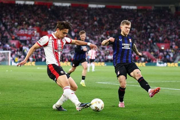 Kuryu Matsuki of Southampton under pressure from Riley McGree of Middlesbrough Southampton v Middlesbrough, EFL Sky Bet Championship, Play-Off Semi Final, Second Leg, Football, St Mary s Stadium, Southampton, UK - 12 May 2026Southampton St Mary s Stadium United Kingdom EDITORIAL USE ONLY No use with unauthorised audio, video, data, fixture lists, club league logos or live services. Online in-match use limited to 120 images, no video emulation. No use in betting, games or single club league player publications. Copyright: xSimonxDael Shutterstockx 16871476ar