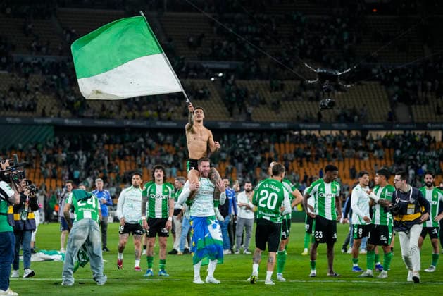 May 12, 2026, Sevilla, Sevilla, SPAIN: Players of Real Betis celebrate qualifies for the UEFA Champions League during the Spanish league, LaLiga EA Sports, football match played between Real Betis and Elche CF at La Cartuja stadium on May 12, 2026, in Sevilla, Spain. Sevilla SPAIN - ZUMAa181 20260512_zaa_a181_171 Copyright: xJoaquinxCorcherox