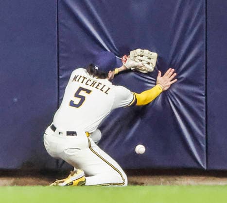 Milwaukee Brewers center fielder Garrett Mitchell chases a ball hit for a double by San Diego Padres third baseman Miguel Andujar in the eighth inning of the MLB, Baseball Herren, USA game between the San Diego Padres and the Milwaukee Brewers at American Family Field in Milwaukee, Wisconsin on Tuesday, May 12, 2026. The Brewers defeated the Padres 6-4.  MIL20260512842 TANNENxMAURY