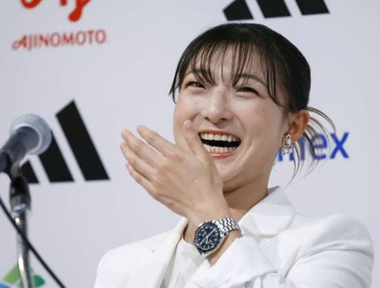 Figure skating, Eiskunstlauf Sakamoto at retirement press conference, PK, Pressekonferenz Japan s Kaori Sakamoto, a two-time women s figure skating Olympic medalist and four-time world champion, laughs through her tears during her retirement press conference at a hotel in Kobe, Hyogo Prefecture in western Japan, on May 13, 2026.  A14AA0005548739P