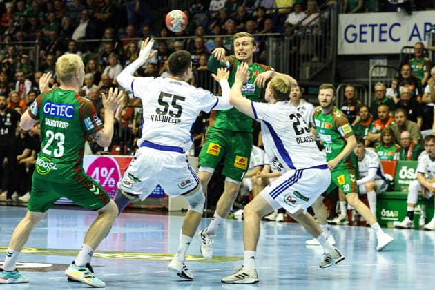 Gisli Kristjansson SC Magdeburg,10 vs Einar Olafsson HSV Hamburg,23 and Azat Valiullin HSV Hamburg,55 Handball Bundesliga Season 2025 2026 SC Magdeburg vs HSV Hamburg at the GETEC Arena in Magdeburg Action,Handball,Germany,10 05 2026