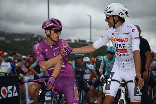 May 13, 2026, Praia A Mare, ITALY: French Paul Magnier of Soudal Quick-Step Team wearing the points classification leader s cyclamen jersey, swiss rider Jan Christen of Uae Team Emirates Xrg wearing the best young rider s white jersey, waiting to the start for the 05th stage of the 109 Giro d Italia 2026, cycling race over 203 km from Praia a Mare to Potenza, 13 May 2026. ANSA LUCA ZENNARO. Giro D Italia Cycling Tour - Stage 05  - ZUMAa110 20260513_zaf_a110_008 Copyright: xLucaxZennarox