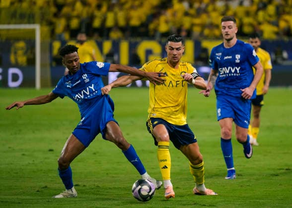 RIYADH, SAUDI ARABIA - MAY 12: Cristiano Ronaldo of Al Nassr battles for the ball during the Saudi Pro League match between Al Nassr and Al Hilal at Al Awwal Park on May 12, 2026 in Riyadh, Saudi Arabia.  Copyright: xKhalidxAlhaj MBxMediax