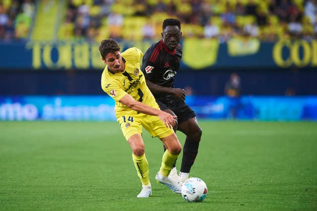 Santi Comesana Villarreal CF and Akor Adams Sevilla FC during the LaLiga EA Sports match between Villarreal CF and Sevilla FC at Estadio de la Ceramica on May 13, 2026 in Villarreal, Spain Photo by Maria Jose Segovia DeFodi Images