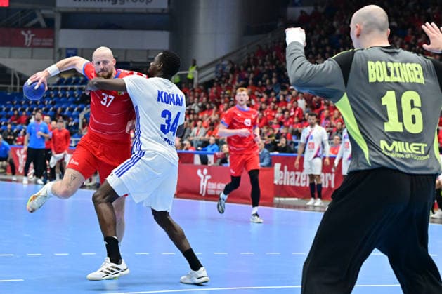L-R Jan Uzek (CZE) and Karl Konan and Charles Bolzinger (both FRA) in action during the World Handball Championship qualification playoff men s match: Czechia vs France in Brno, Czech Republic, May 13, 2026. (CTKxPhoto VaclavxSalek) CTKPhotoP2026051309064  CTKPhotoP2026051309064