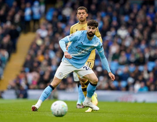 Manchester, England, 13th May 2026. Josko Gvardiol of Manchester City intercept a ball for Brennan Johnson of Crystal Palace during the Manchester City vs Crystal Palace Premier League match at the Etihad Stadium, Manchester. Picture credit should read: Andrew Yates Sportimage EDITORIAL USE ONLY. No use with unauthorised audio, video, data, fixture lists, club league logos or live services. Online in-match use limited to 120 images, no video emulation. No use in betting, games or single club league player publications. SPI_017_AY_Man_City_Palace SPI-4799-0017