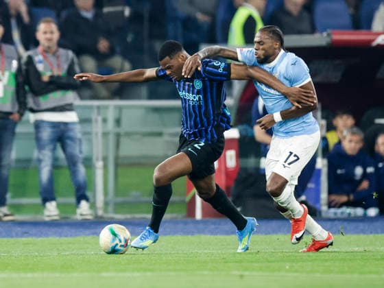 Coppa Italia final SS Lazio and FC Internazionale Inter s Dutch defender Denzel Dumfries challenges for the ball with lazio™s Portuguese defender Nuno Tavares during the Coppa Italia final between SS Lazio and FC Internazionale at the Stadio Olimpico in Rome on 13 May 2026. _BPH8083_1 Copyright: xAntonioxBalascox