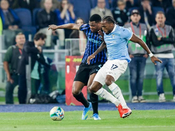 Coppa Italia final SS Lazio and FC Internazionale Inter s Dutch defender Denzel Dumfries challenges for the ball with lazio™s Portuguese defender Nuno Tavares during the Coppa Italia final between SS Lazio and FC Internazionale at the Stadio Olimpico in Rome on 13 May 2026. _BPH8097_1 Copyright: xAntonioxBalascox