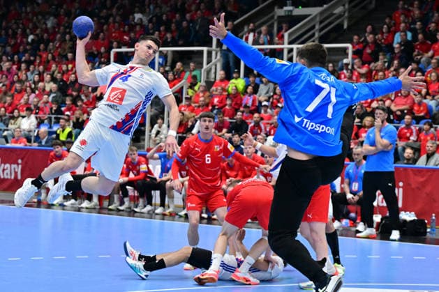 L-R Aymeric Minne (FRA), Dominik Skopar (CZE) and Simon Mizera (CZE) in action during the World Handball Championship qualification playoff men s match: Czechia vs France in Brno, Czech Republic, May 13, 2026. (CTKxPhoto VaclavxSalek) CTKPhotoP2026051309547  CTKPhotoP2026051309547