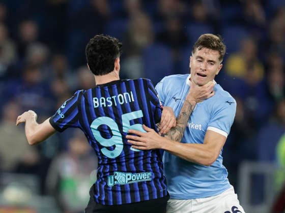 Coppa Italia final SS Lazio and FC Internazionale Inter™s Italian defender Alessandro Bastoni challenges for the ball with lazio™s Croatian midfielder Toma Basic during the Coppa Italia final between SS Lazio and FC Internazionale at the Stadio Olimpico in Rome on 13 May 2026. _BPH9157 Copyright: xAntonioxBalascox