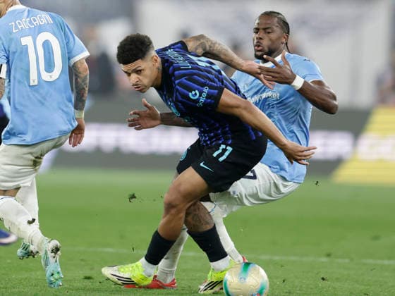Coppa Italia final SS Lazio and FC Internazionale Inter™s Brazilian forward Luis Henrique challenges for the ball with lazio™s Portuguese defender Nuno Tavares during the Coppa Italia final between SS Lazio and FC Internazionale at the Stadio Olimpico in Rome on 13 May 2026. _BPH9535 Copyright: xAntonioxBalascox