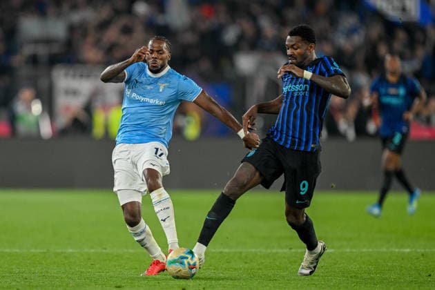 LazioÕs Nuno Tavares fights for the ball with InterÕs Marcus Thuram during the Frecciarossa Italian Cup 2025 2026 final soccer match between Lazio and Inter Milan at the Stadio Olimpico in Rome, Italy - May 13, 2026 - Soccer  Copyright: xTanoxPecoraro LaPressex