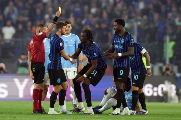 CALCIO - Coppa Italia - Final - SS Lazio vs Inter - FC Internazionale Photo by IPA ABACAPRESS.COM84649619 - Rome, Italy - May 13, 2026: The referee Marco Guida shows the yellow card for Yann Bisseck (Defender) of FC Internazionale during the Coppa Italia Frecciarossa Final football match 2025-2026 between SS Lazio vs Inter - FC Internazionale at Olympic Stadium. Rome Italy  Copyright: xIPAxSport ABACAx