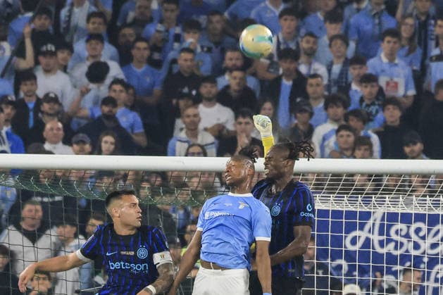 Lazio v Inter Milan - Italian Cup final match ROME, ITALY, MAY 13: Lautaro Martinez (L) and Yann Aurel Bisseck (R), of Inter Milan, and Tijjani Noslin (C), of Lazio, jump for the ball during the Italian Cup football final match between Lazio and Inter Milan at the Olympic stadium in Rome, Italy, on May 13, 2026. Riccardo De Luca Anadolu Rome Italy. Editorial use only. Please get in touch for any other usage.  Copyright: x2026xAnadoluxRiccardoxDexLucax