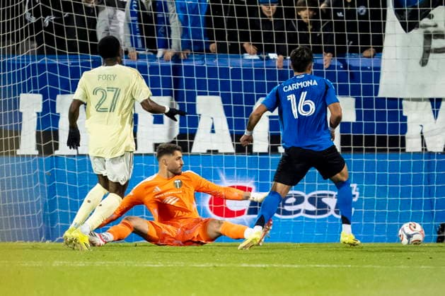 May 13, 2026, Montreal, Pq, Canada: CF Montreal s Wiki Carmona (16) scores on Portland Timbers goalkeeper James Pantemis (centre) during first half MLS, Fussball Herren, USA soccer action in Montreal on Wednesday, May 13, 2026. Canada News - May 13, 2026  - ZUMAc35_ 20260513_zaf_c35_197 Copyright: xChristopherxKatsarovx