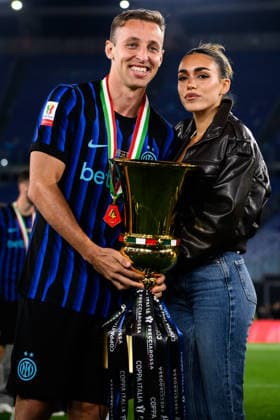 Davide Frattesi of FC Internazionale and Eleonora Piredda celebrate with the trophy at the end of the 2025 2026 Coppa Italia football final between SS Lazio and FC Internazionale at Stadio Olimpico in Rome (Italy), May 13, 2026. AndreaxStaccioli