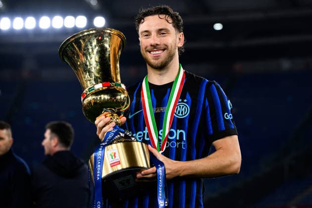 Carlos Augusto of FC Internazionale celebrates with the trophy at the end of the 2025 2026 Coppa Italia football final between SS Lazio and FC Internazionale at Stadio Olimpico in Rome (Italy), May 13, 2026. AndreaxStaccioli