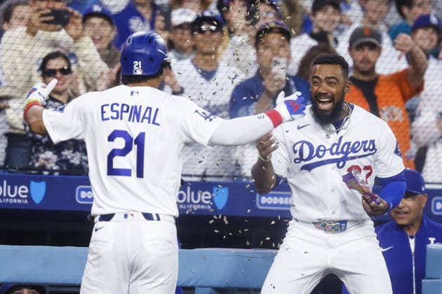 MLB, Baseball Herren, USA - Los Angeles Dodgers vs San Francisco Giants Dodgers infielder Santiago Espinal (L) celebrates with outfielder Teoscar Hernandez (R) after hitting a home run in the third inning of an MLB game between the Los Angeles Dodgers and the San Francisco Giants at Uniqlo Field at Dodger Stadium in Los Angeles, California, USA, 13 May 2026. LOS ANGELES CALIFORNIA United States  Copyright: xCHRISxTORRESx