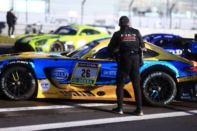 Adam Christodoulou Christopher Lulham Marek Böckmann Mikaël Grenier PROsport Racing with team member at the Nürburgring Driver and vehicle in the paddock Copyright: xMichaelxGelhardtx