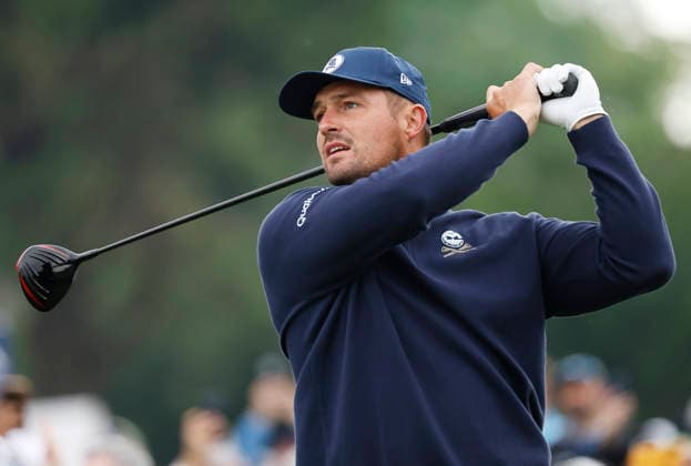 Bryson DeChambeau watches his tee shot on the 11th hole during the first round of the 2026 PGA, Golf Herren Championship at Aronimink Golf Club in Newtown Square, Pennsylvania, on Thursday, May 14, 2026.  PHI20260514822 LAURENCExKESTERSON