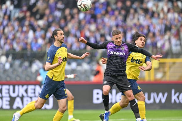 260514 Cupfinal Royale Union Saint-Gilloise vs RSC Anderlecht Christian Burgess (16) of Union and Kevin Mac Allister (5) of Union fighting for the ball with Thorgan Hazard (11) of Anderlecht during the Croky Cup final 2026 between Royale Union Saint-Gilloise and RSC Anderlecht on May 14 , 2026 in Brussels, Belgium. (Photo by David Catry Isosport) Brussels Belgium  Copyright: xDavidxCatryx 20260514DC2_5711