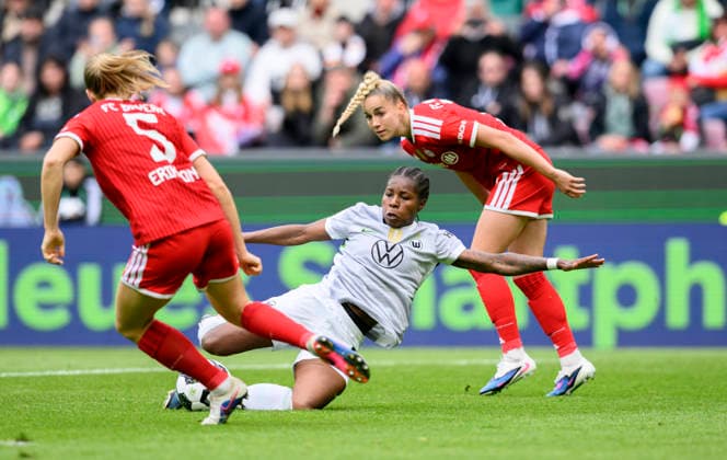 l r Magdalena ERIKSSON M , Lineth BEERENSTEYN WOB , Giulia GWINN M action, duel DFB Cup Womens Final 2026, VfL Wolfsburg WOB FC Bayern Muenchen M , on 14 05 2026 in Cologne Germany DFB regulations prohibit any use of photographs as image sequences and or quasi video Â
