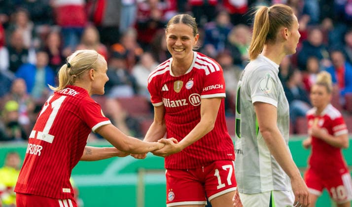 14 5 2026, Football, GER, Women, DFB Cup, Season 2025 2026,Final, FC Bayern Munich VfL Wolfsburg, Pernille Harder FC Bayern Munich, left and Klara Bühl FC Bayern Munich, center cheer Cologne RheinenergieSTADION North Rhine-Westphalia Germany