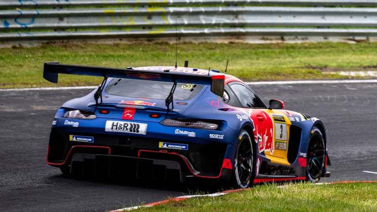 Daniel Juncadella Jules Gounon Lucas Auer Max Verstappen Mercedes AMG Team Verstappen Racing - the Mercedes AMG GT3 with the starting number 3 of Mercedes AMG Team Verstappen Racing - takes a corner on the Nordschleife of the Nürburgring The vehicle wears the striking Red Bull livery in blue, red and yellow with sponsors such as H R, Michelin, Multimatic, Sparco and Multimatic The powerful rear wing and the red accents of the aerodynamic parts are clearly visible The picture was taken during the 24h Nürburgring 2026 Mercedes AMG GT3 3 of Mercedes AMG Team Verstappen Racing on the Nordschleife Copyright: xspeedshotx