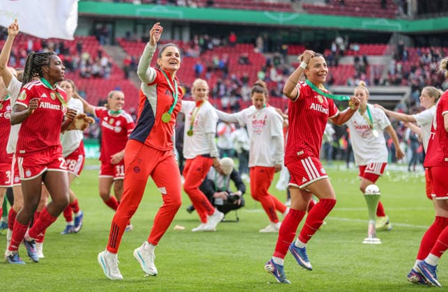 GER, Cologne, Vfl Wolfsburg vs FC Bayern Munich, DFB Cup Women, Football, DFB, Season 2025 2026, Rhein Energie Stadium, Final in picture Joy, Emotions after the victory in the DFB Cup Womens Final, Bayern Munich women win 4 0 by goals, cup, team, Jovana DamnjanoviÄ‡ Bayern Munich 9 , Arianna Caruso Bayern Munich 27 DFB DFL REGULATIONS PROHIBIT ANY USE OF PHOTOGRAPHS AS IMAGE SEQUENCES AND OR QUASI VIDEO, 14 05 2026 Copyright: HMBxMedia HendrikxHamelau