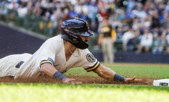 Milwaukee Brewers shortstop David Hamilton slides into third base as he advances on a throwing error by San Diego Padres starting pitcher Griffin Canning in the second inning of the MLB, Baseball Herren, USA game between the San Diego Padres and the Milwaukee Brewers at American Family Field in Milwaukee, Wisconsin on Thursday, May 14, 2026.  MIL20260514812 TANNENxMAURY