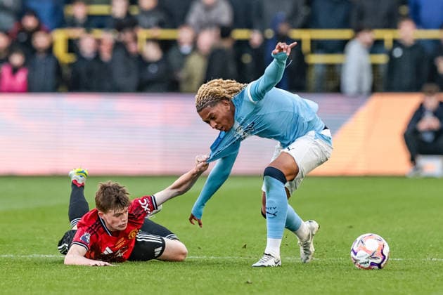 FA Youth Cup Final: Manchester City U18 v Manchester United, ManU U18 Tyrone Samba of Manchester City U18 s is fouled by Rafe Mccormack of Manchester United U18 s during the FA Youth Cup Final match Manchester City U18 vs Manchester United U18 at Joie Stadium, Manchester, United Kingdom on 14 May 2026 (Photo by Mark Cosgrove News Images) Manchester Joie Stadium Greater Manchester United Kingdom Copyright: xMarkxCosgrove NewsxImagesx