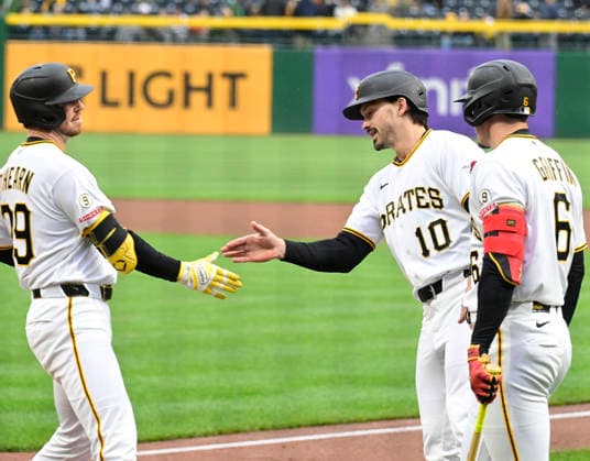 Pittsburgh Pirates right fielder Ryan O Hearn (29) celebrates his homer with Pittsburgh Pirates left fielder Bryan Reynolds (10) and Pittsburgh Pirates shortstop Konnor Griffin (6) n the first inning against the Colorado Rockies at PNC Park on Thursday, May 14, 2026 in Pittsburgh.  PIT2026051406 ArchiexCarpenter
