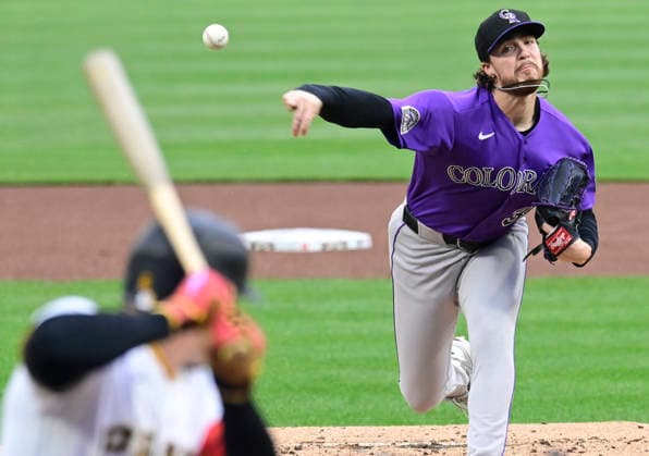 Colorado Rockies pitcher Chase Dollander (32) starts against the Pittsburgh Pirates at PNC Park on Thursday, May 14, 2026 in Pittsburgh.  PIT2026051407 ArchiexCarpenter