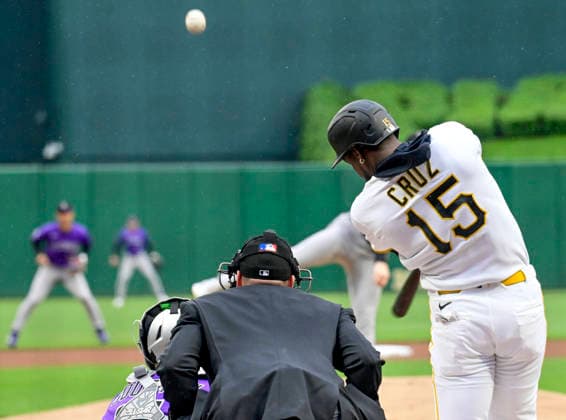 Pittsburgh Pirates center fielder Oneil Cruz (15) doubles to left in the first inning against the Colorado Rockies at PNC Park on Thursday, May 14, 2026 in Pittsburgh.  PIT2026051409 ArchiexCarpenter
