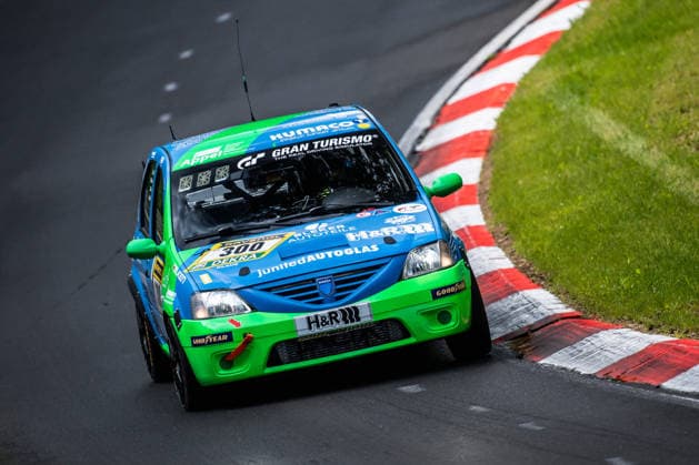 The Dacia Logan with starting number 300 from the Ollis Garage Racing team with drivers Oliver Kriese, Christian Geilfus, Robert Neumann and Alexander Becker drives during Qualifying 1 on the Nordschleife of the Nürburgring Nürburg Rhineland-Palatinate Germany