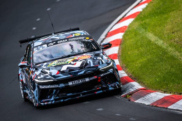 The Hyundai Motor Company ELANTRA N1 RP with starting number 302 from Team Hyundai Motorsport N with the drivers Gyumin Kim, Mark Wallenwein, Woojin Shin and Carlos Jose Sepulveda Irizarry drives during Qualifying 1 on the Nordschleife of the Nürburgring Nürburg Rhineland-Palatinate Germany