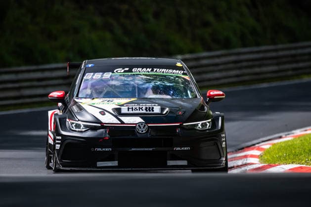 The VW Golf GTI Clubsport 24h with starting number 76 from the Max Kruse Racing team with drivers Timo Hochwind, Nicholas Otto, Fabian Vettel and Jonathan Mogotsi drives during Qualifying 1 on the Nordschleife of the Nürburgring Nürburg Rhineland-Palatinate Germany