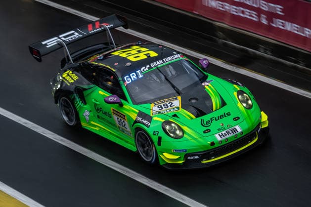 The Porsche 911 GT3 CUP MR with starting number 992 from Team Manthey Team eFuel Griesemann with drivers Björn Griesemann, Georg Griesemann, Dirk Adorf and Marco Holzer drives in the pit lane of the Nürburgring Nürburg Rhineland-Palatinate Germany during Qualifying 2