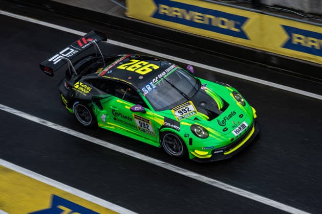 The Porsche 911 GT3 CUP MR with starting number 992 from Team Manthey Team eFuel Griesemann with drivers Björn Griesemann, Georg Griesemann, Dirk Adorf and Marco Holzer drives in the pit lane of the Nürburgring Nürburg Rhineland-Palatinate Germany during Qualifying 2