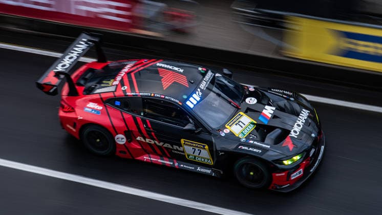 The BMW M4 GT3 EVO with starting number 77 from Team Schubert Motorsport with drivers Marco Wittmann, Philpp Eng, Charles Weerts and Robin Frijns drives in the pit lane of the Nürburgring Nürburg Rhineland-Palatinate Germany during Qualifying 2