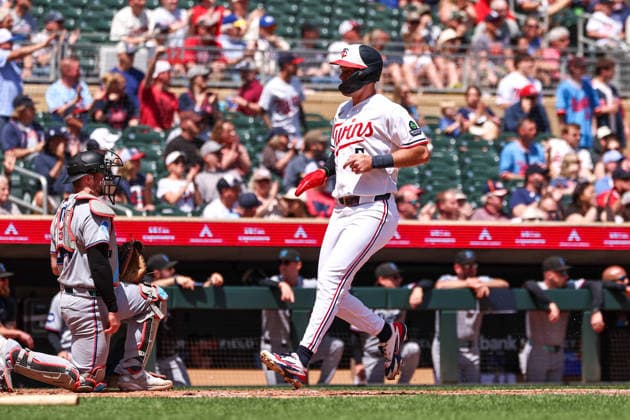 May 14, 2026, Minneapolis, Minnesota, USA: Minnesota Twins center fielder Ryan Kreidler (5) scores on a RBI double hit by Minnesota Twins right fielder AUSTIN MARTIN (16) in the second inning during a MLB, Baseball Herren, USA Baseball game between the Miami Marlins and the Minnesota Twins at Target Field in Minneapolis, Minnesota on May 14th, 2026. ZUMA Press Wire. Minneapolis USA - ZUMAg254 20260514_zsp_g254_024 Copyright: xStevenxGarciax