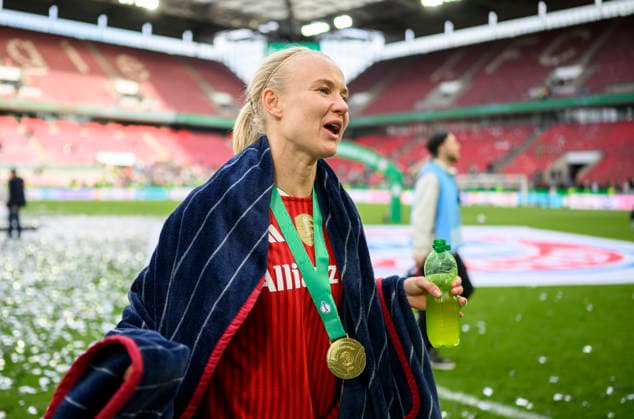 Final cheer Bayern Muenchen , Pernille HARDER M DFB Pokal der Frauen Finale 2026, VfL Wolfsburg WOB FC Bayern Muenchen M 0 4, am 14 05 2026 in Koeln Germany DFB regulations prohibit any use of photographs as image sequences and or quasi video Â