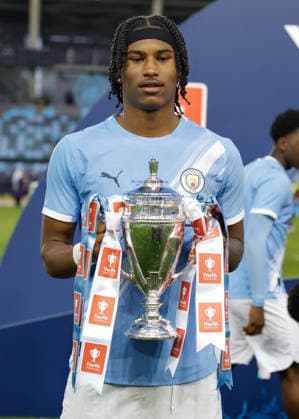 Manchester, England, 14th May 2026. Reigan Heskey of Manchester City celebrates with the FA Youth Cup trophy following the Manchester City U18 vs Manchester United, ManU U18 FA Youth Cup Final match at the Academy Stadium, Manchester. Picture credit should read: Cody Froggatt Sportimage EDITORIAL USE ONLY. No use with unauthorised audio, video, data, fixture lists, club league logos or live services. Online in-match use limited to 120 images, no video emulation. No use in betting, games or single club league player publications. SPI_088_CF_MANCHESTER_CITY_U18_V_MANCHESTER_UNITED_U18 SPI-4801-0086