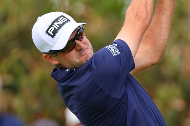 NEWTON SQUARE, PA - MAY 14: Corey Conners of the United States tees off at the first tee during round 1 of the 2026 PGA, Golf Herren Championship on May 14, 2026 at Aronimink Golf Club in Newtown Square, Pennsylvania. (Photo by Rich Graessle Icon Sportswire) GOLF: MAY 14 PGA PGA Championship EDITORIAL USE ONLY Icon260514255351